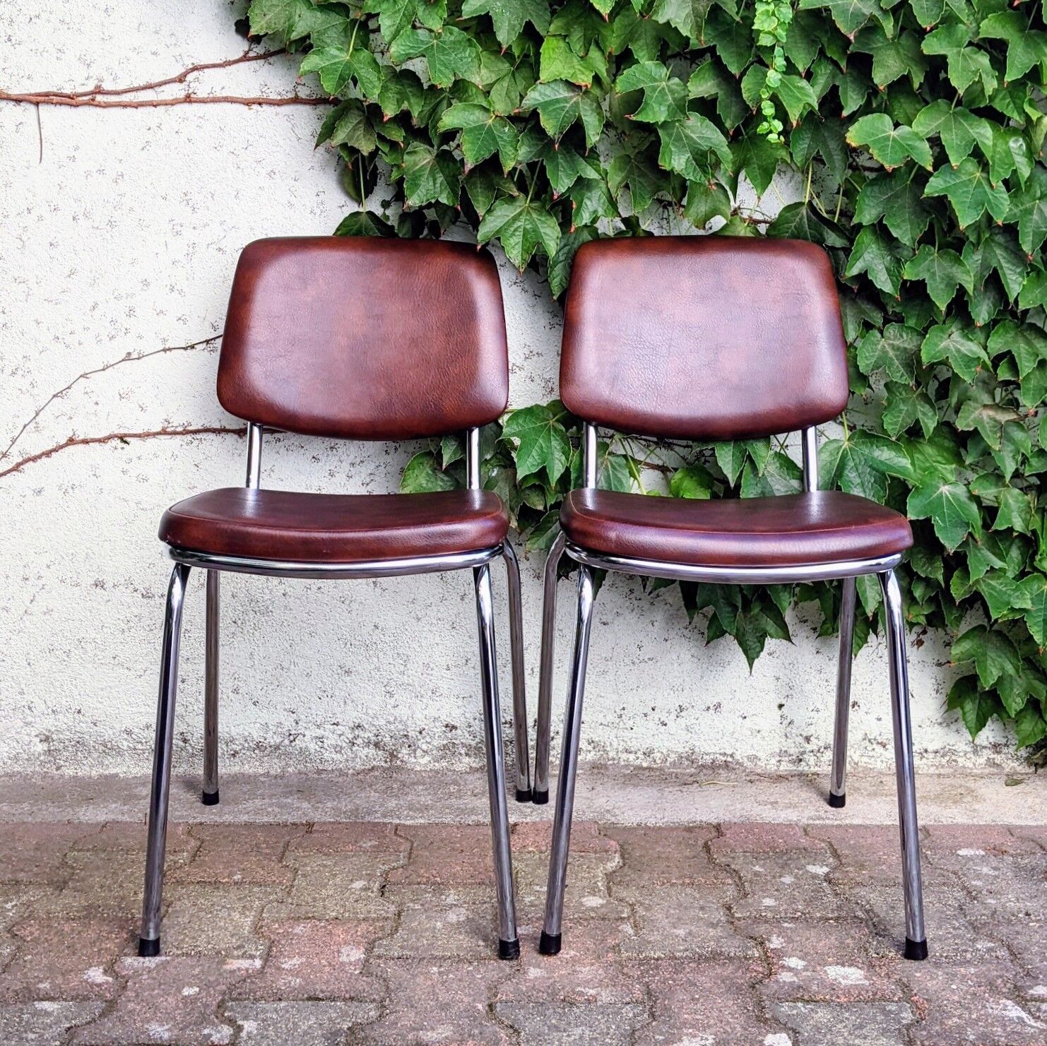 70s metal and imitation leather chairs