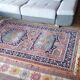 Vintage Iranian Kenareh rug from the 1980s. Handcrafted.
