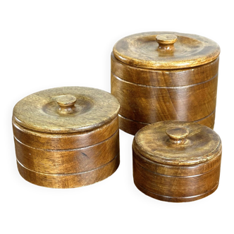 Set of three teak storage boxes