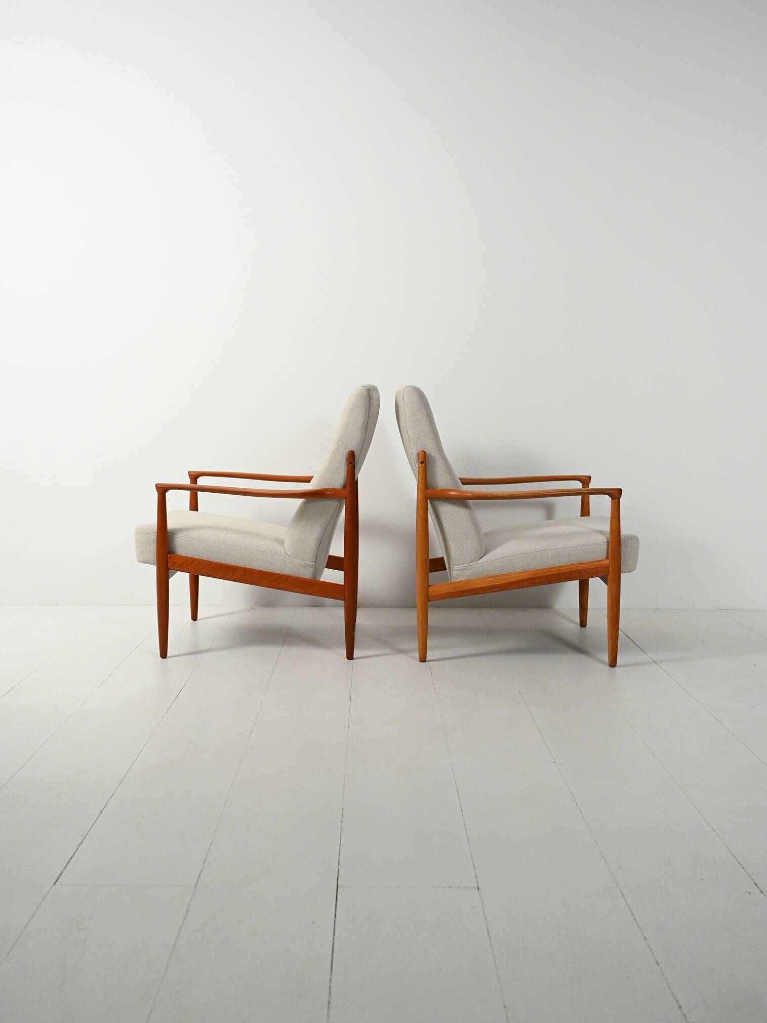 Pair of Scandinavian teak armchairs, 1950s–60s