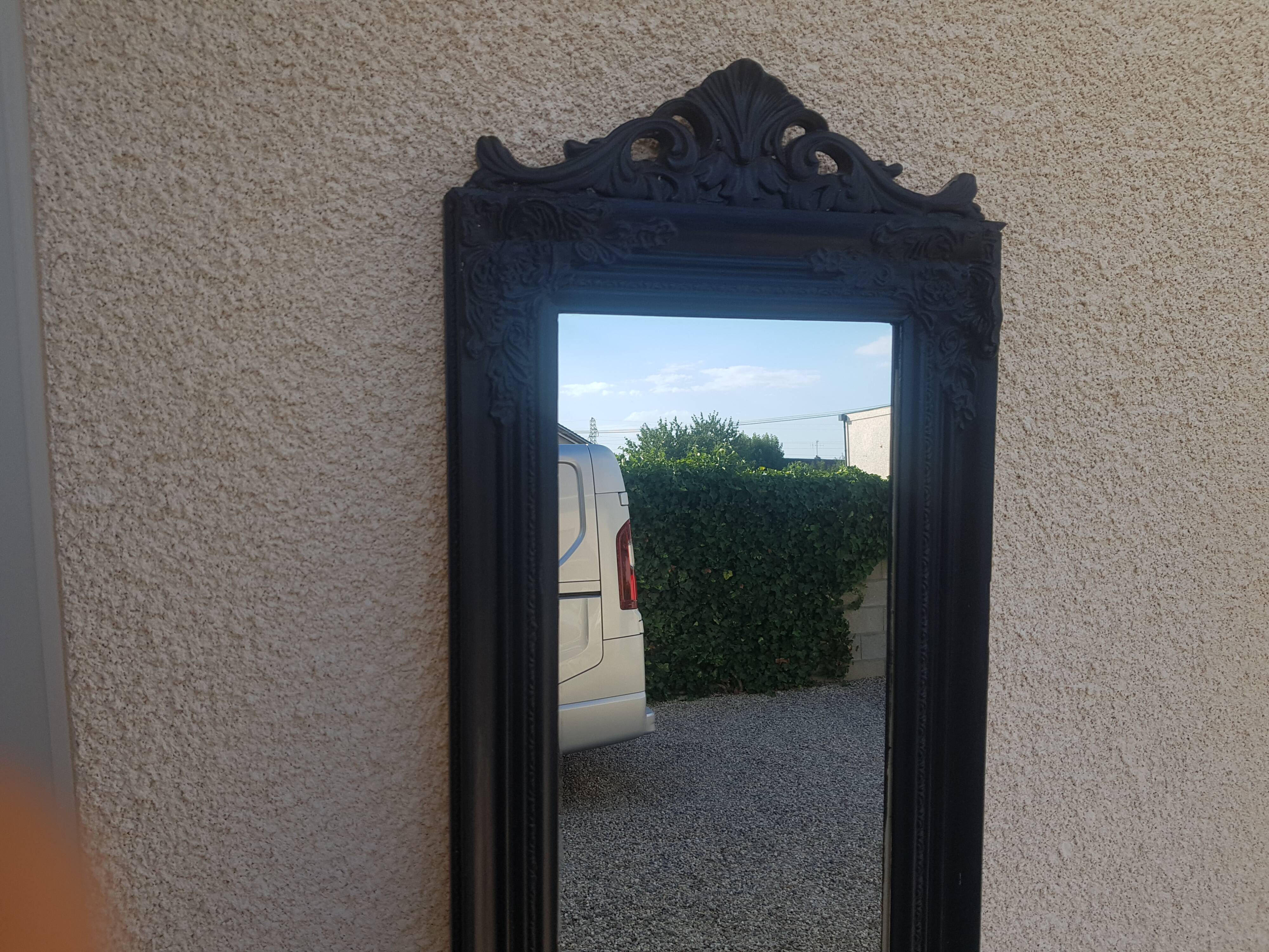 Black empire style mirror