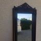 Black empire style mirror
