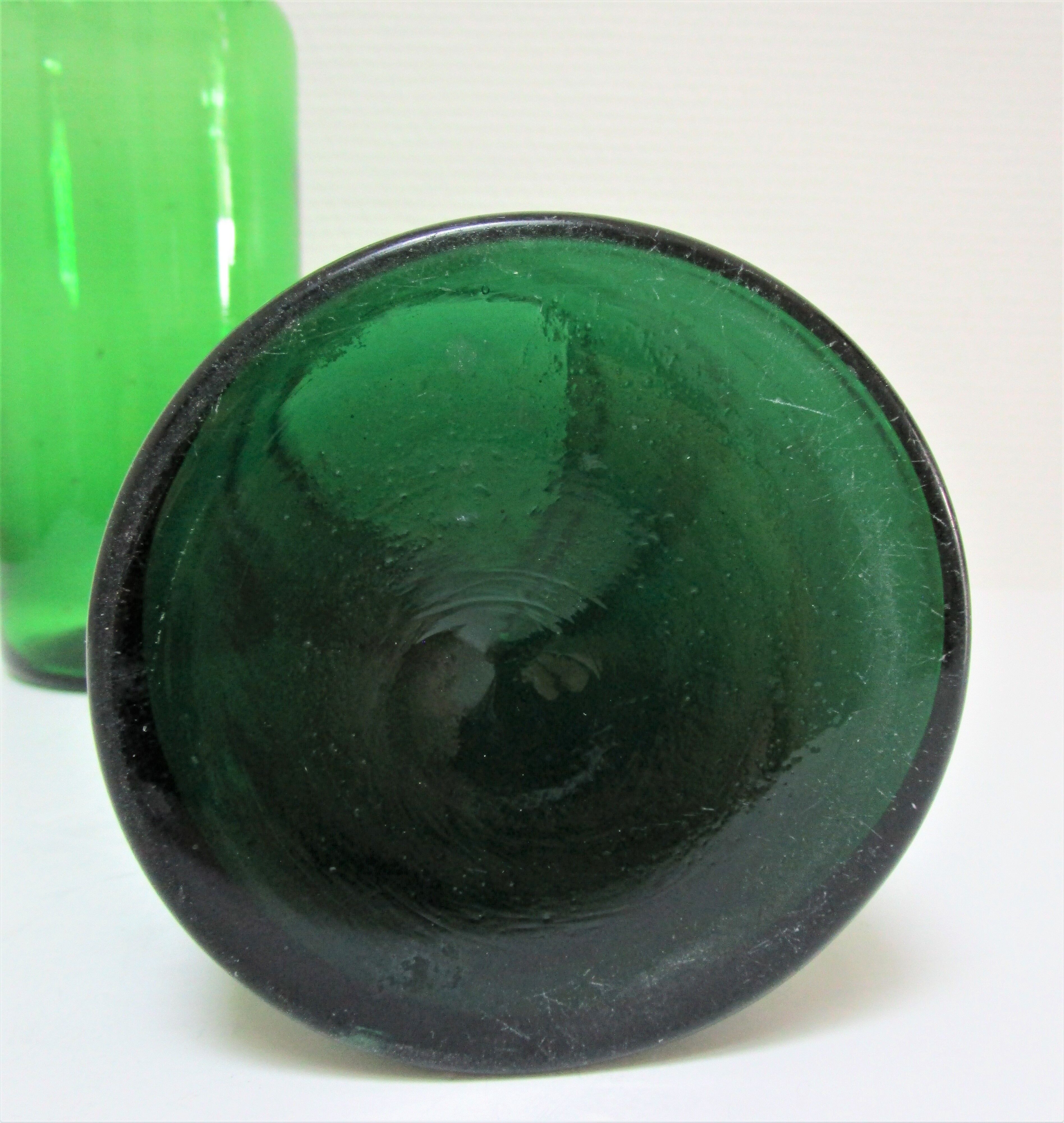 Two old green blown glass jars early 20th century
