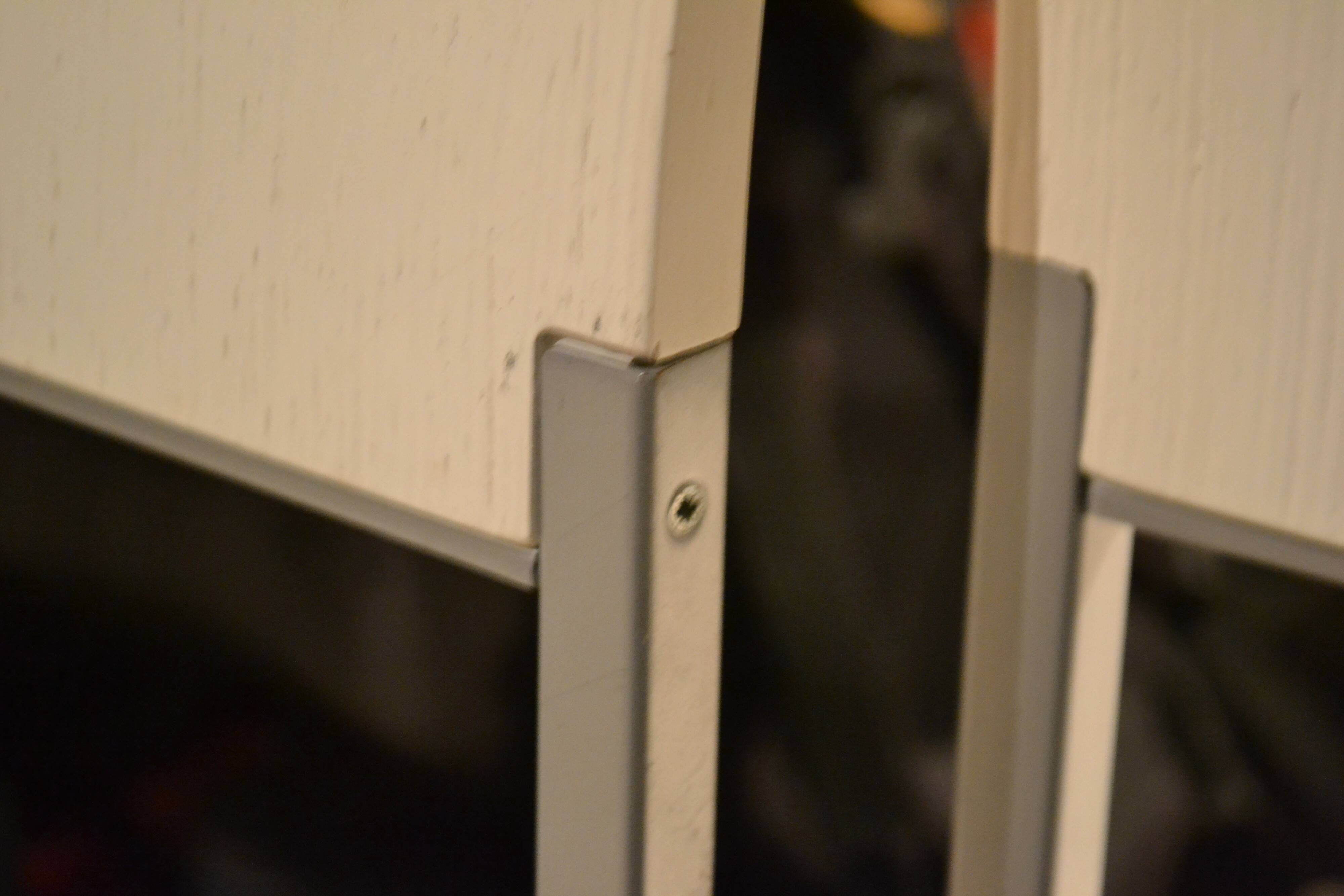 Set of 4 vintage metal and wood chairs from the 1990s.