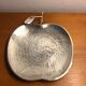 Empty pocket, apple-shaped cut