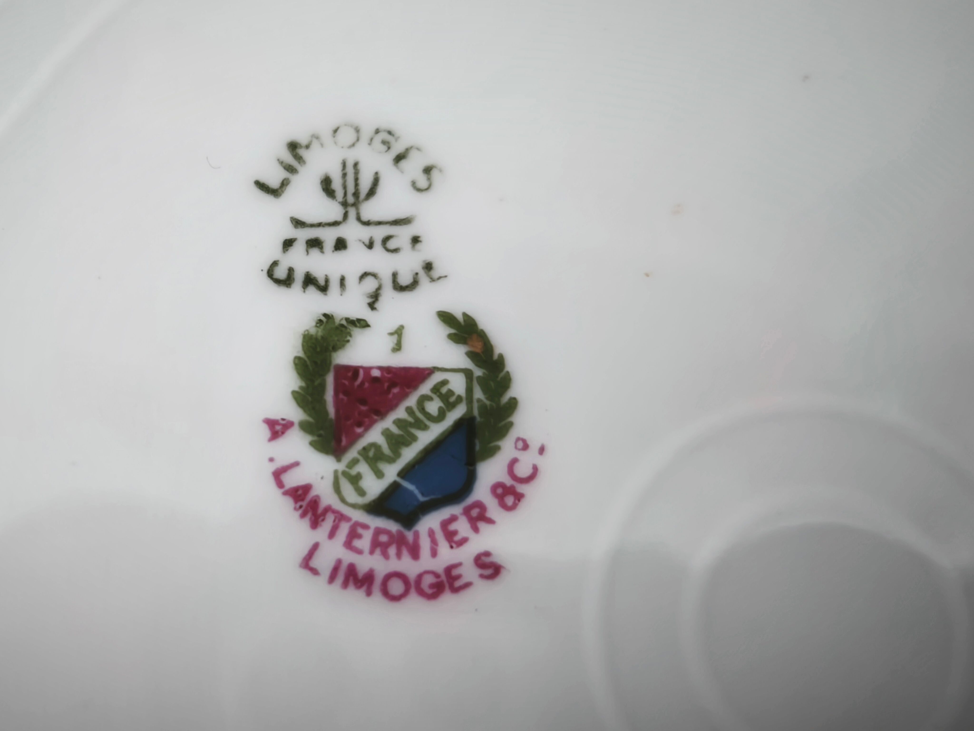 Set of 11 flat plates in Limoges porcelain by Maison Lanternier & C.