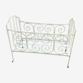 Old crib in pale green wrought iron early twentieth