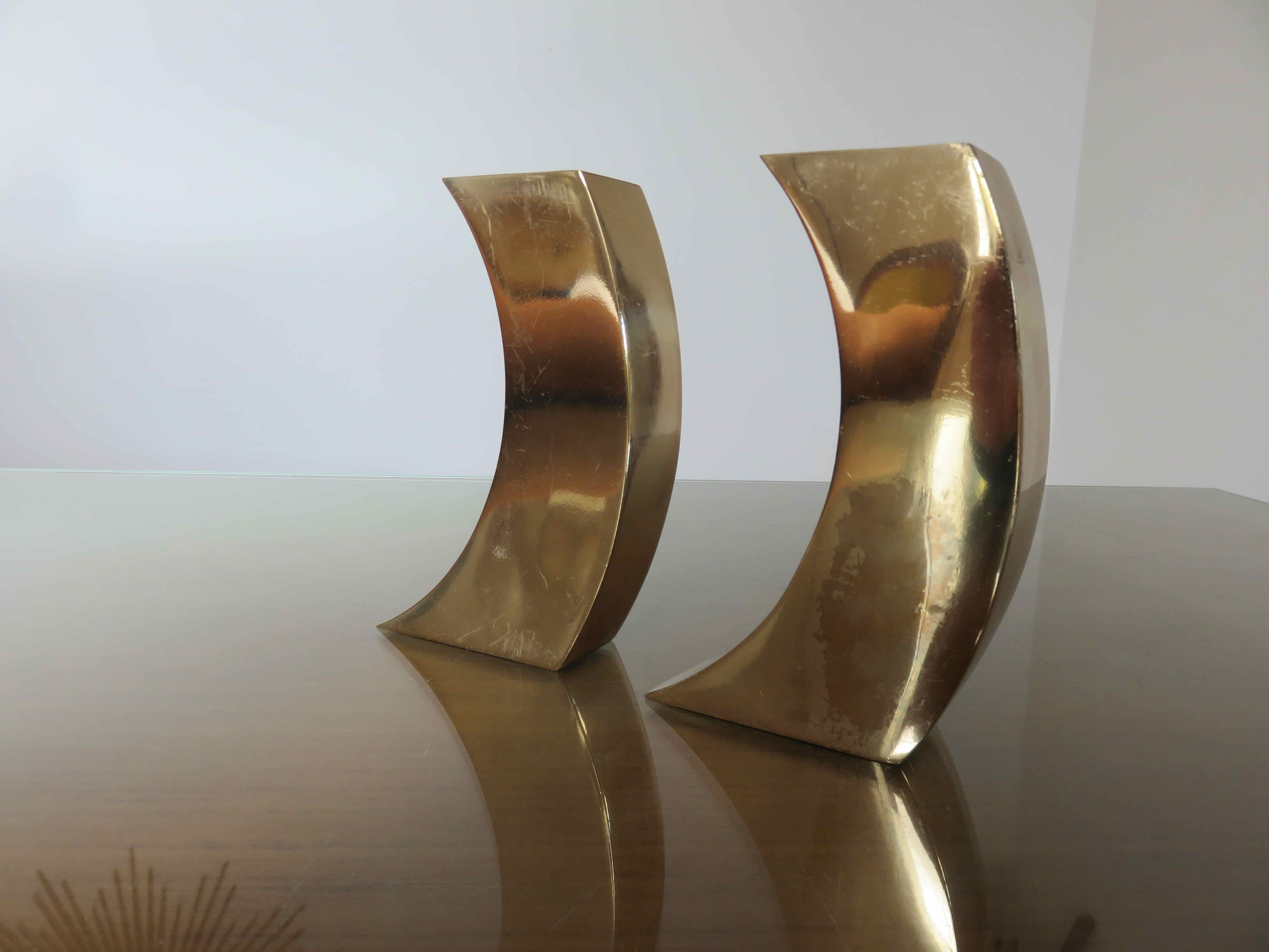Pair of candle holders in golden brass, 70s