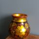 Khokhloma vase, Russian lacquered wood craftsmanship, hand-painted floral decoration.