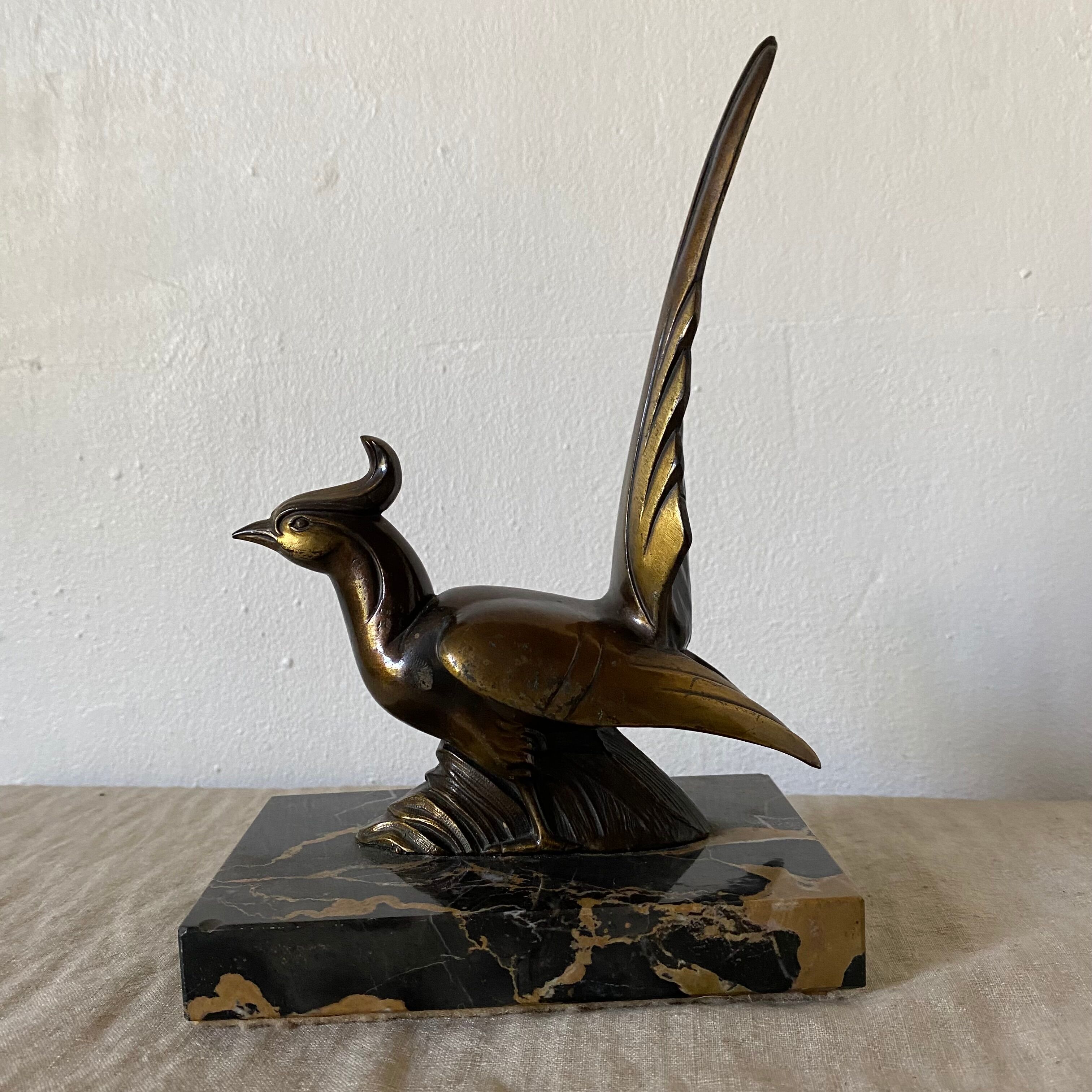 Greenhouse books bird marble