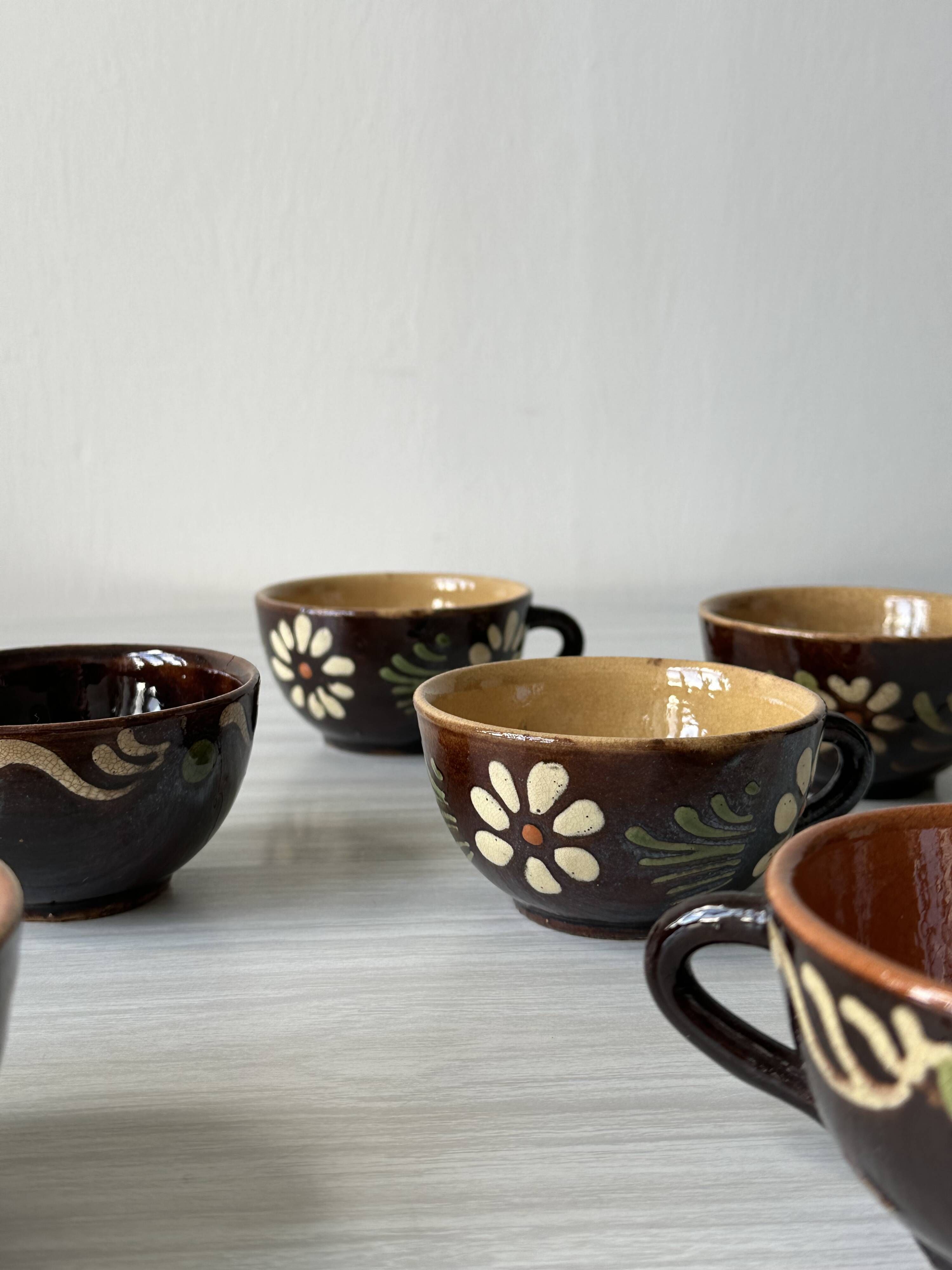 Lot of mismatched Alsatian pottery coffee cups