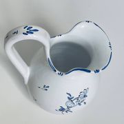 Moustiers pitcher with blue floral decoration