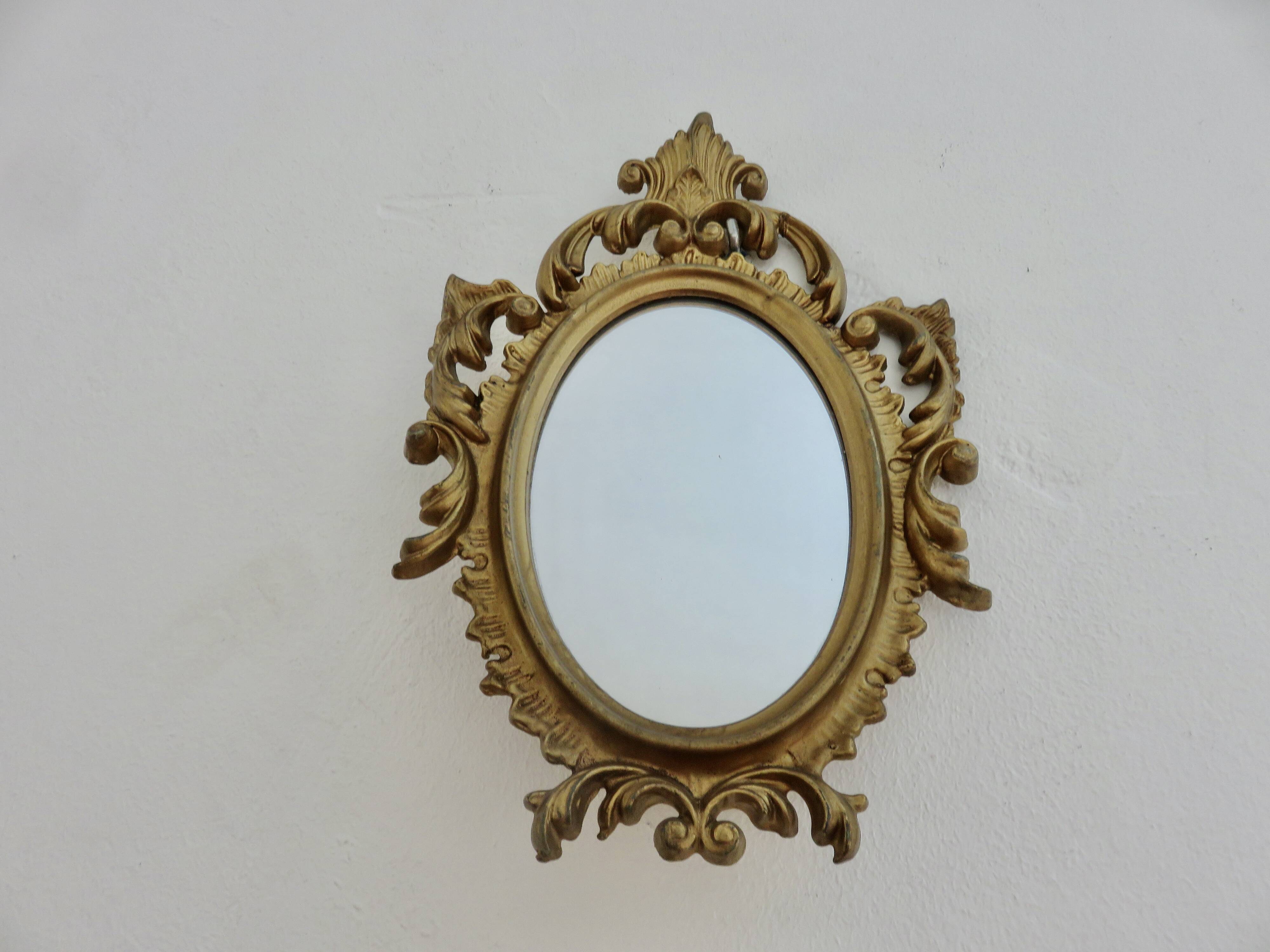 Small baroque mirror in gilded resin, made in Italy, 1970