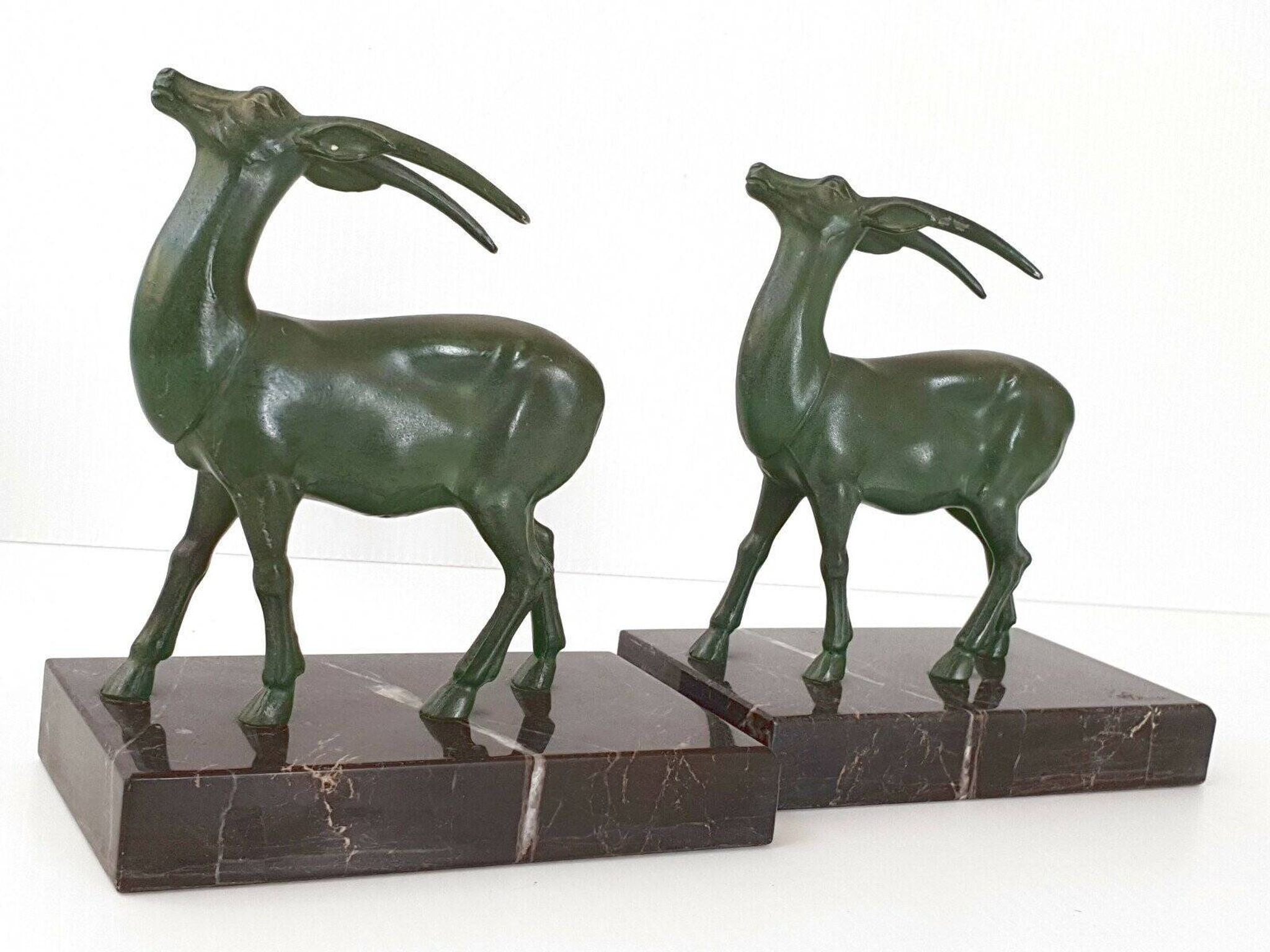 Pair of vintage ibex bookends from 1940-1950 in marble and metal.