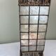 Capiz shell lamp and woven twigs
