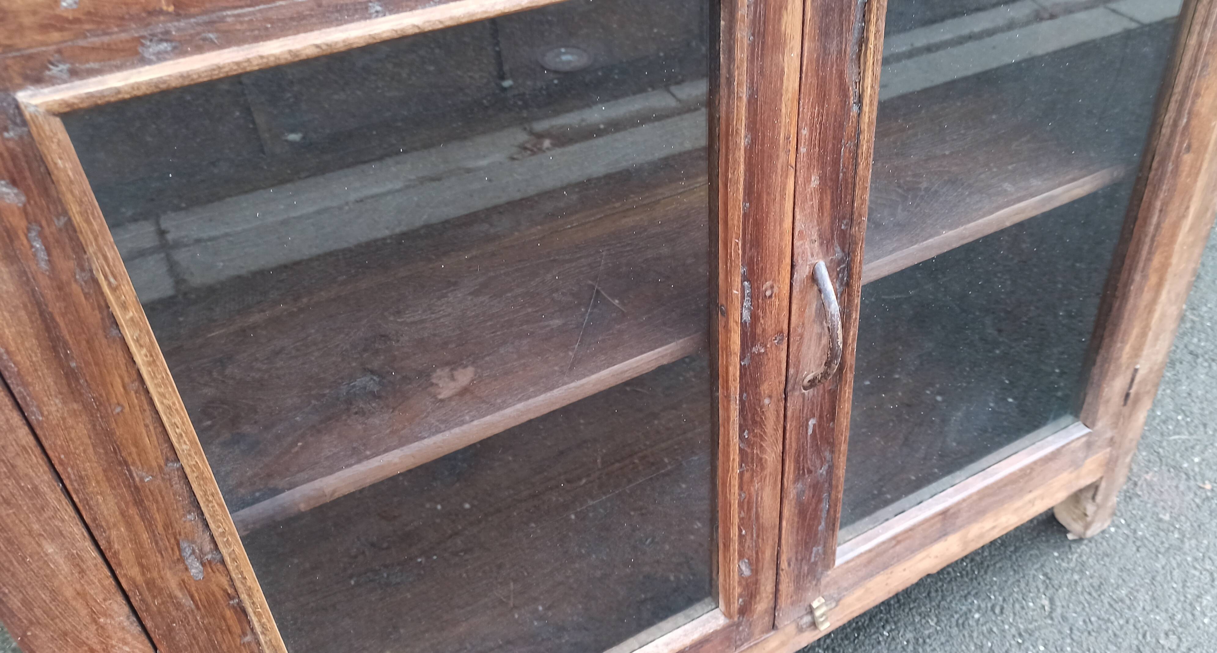 Old wooden glazed cabinet with four doors