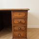 Antique apothecary desk in solid wood with 8 drawers.