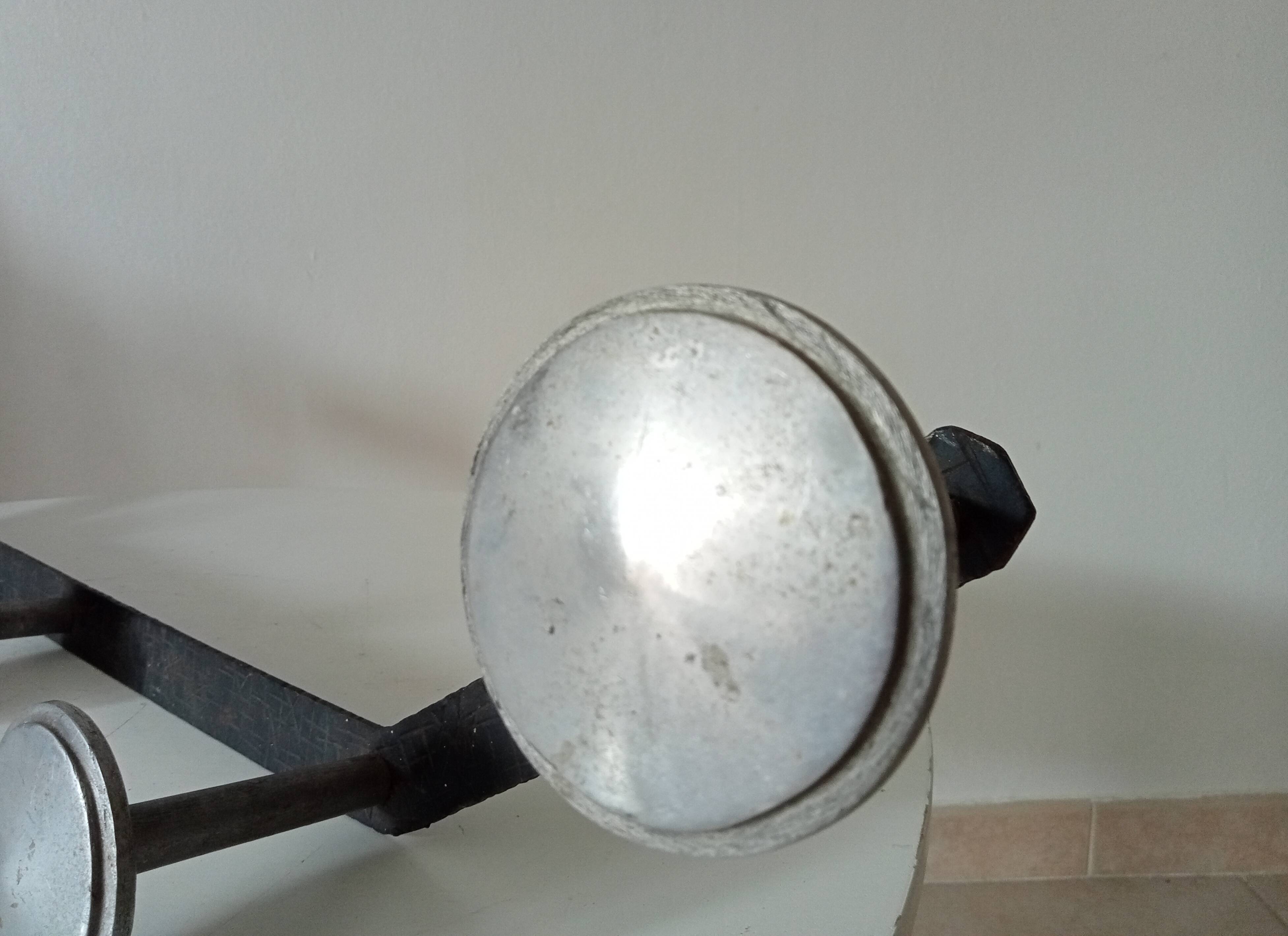 Vintage 1950s wall coat rack, wrought iron with chiselled details and solid aluminium.