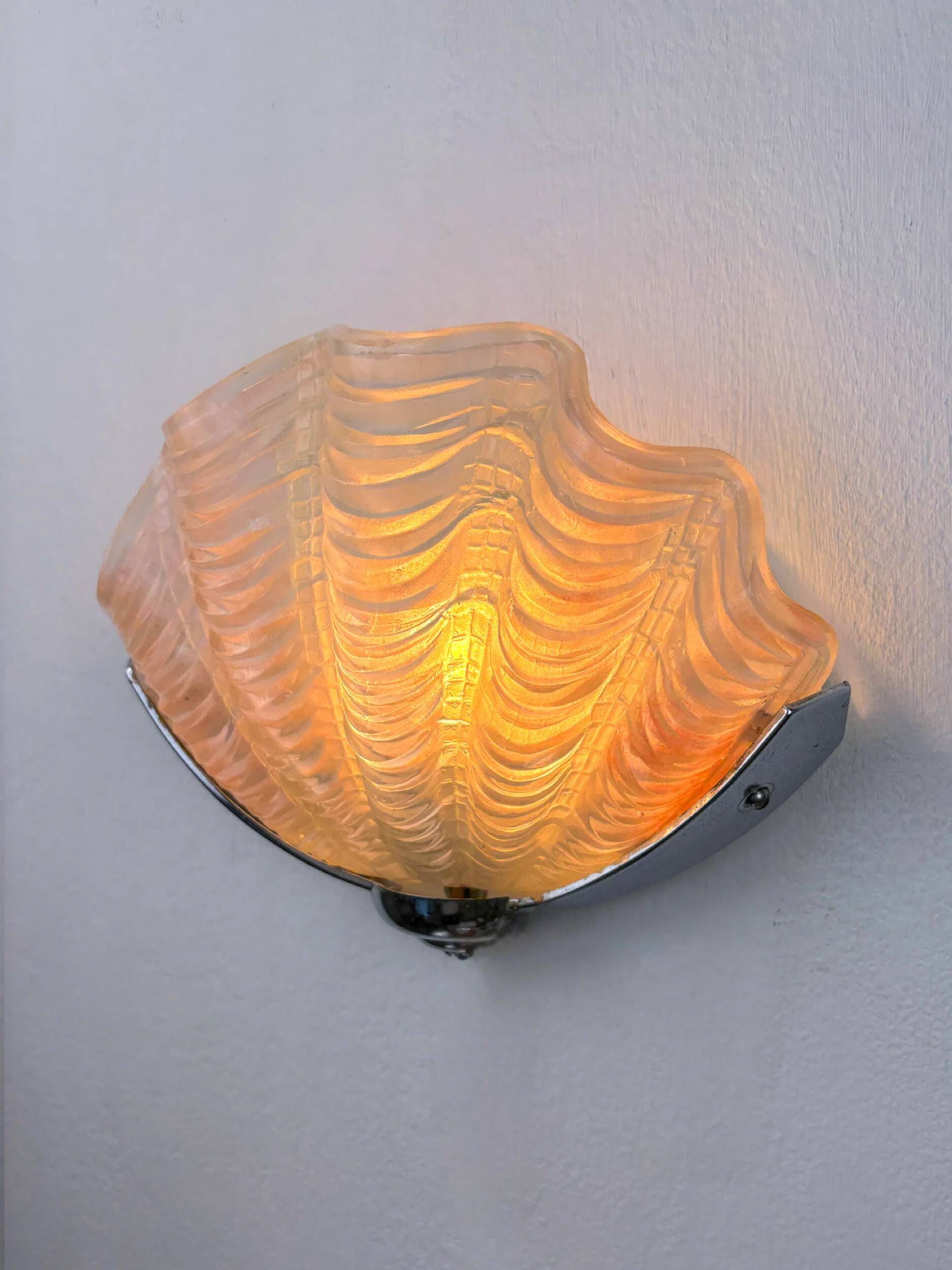 French Art Deco shell wall sconce – amber glass, 1960s