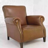 Pair of 1950s club armchairs in imitation leather and wood
