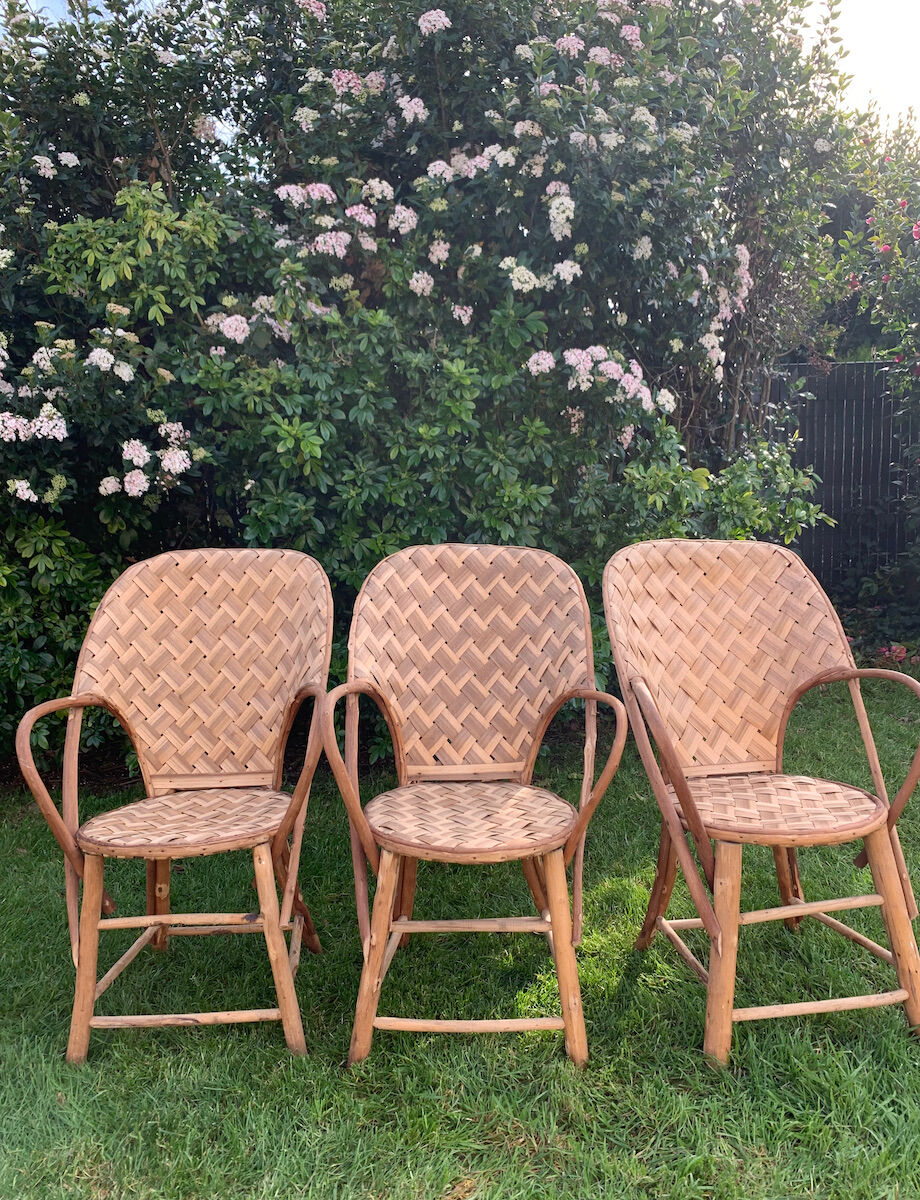 Trio of braided chestnut chairs
