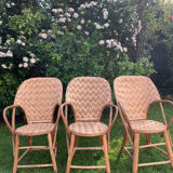 Trio of braided chestnut chairs