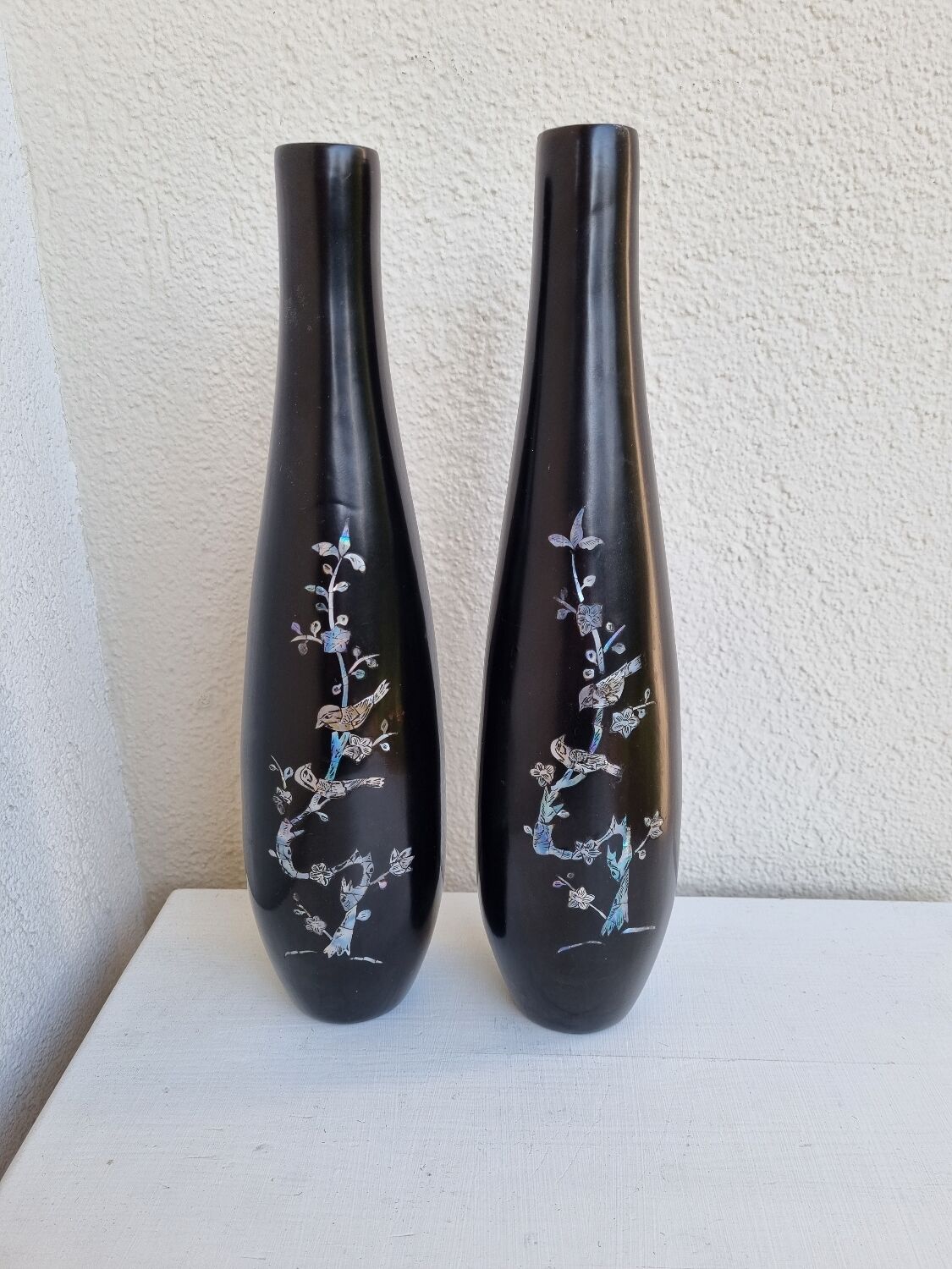 Black lacquered vases