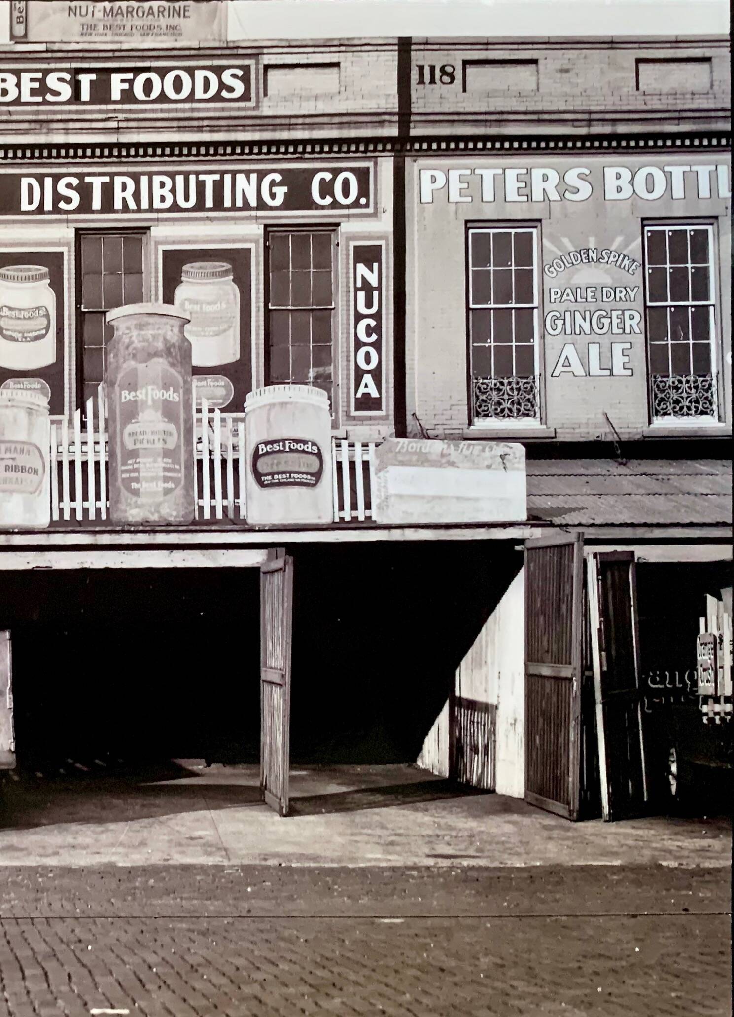 Walker Evans “Waterfront Advertising Warehouses, Louisiana (1938)”