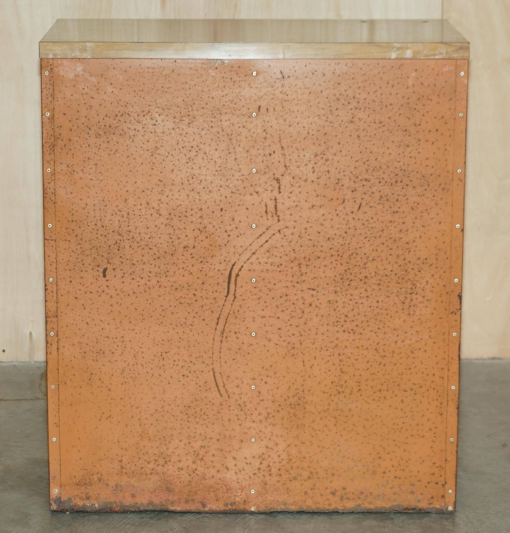 Industrial metal chest of drawers with 30 drawers.