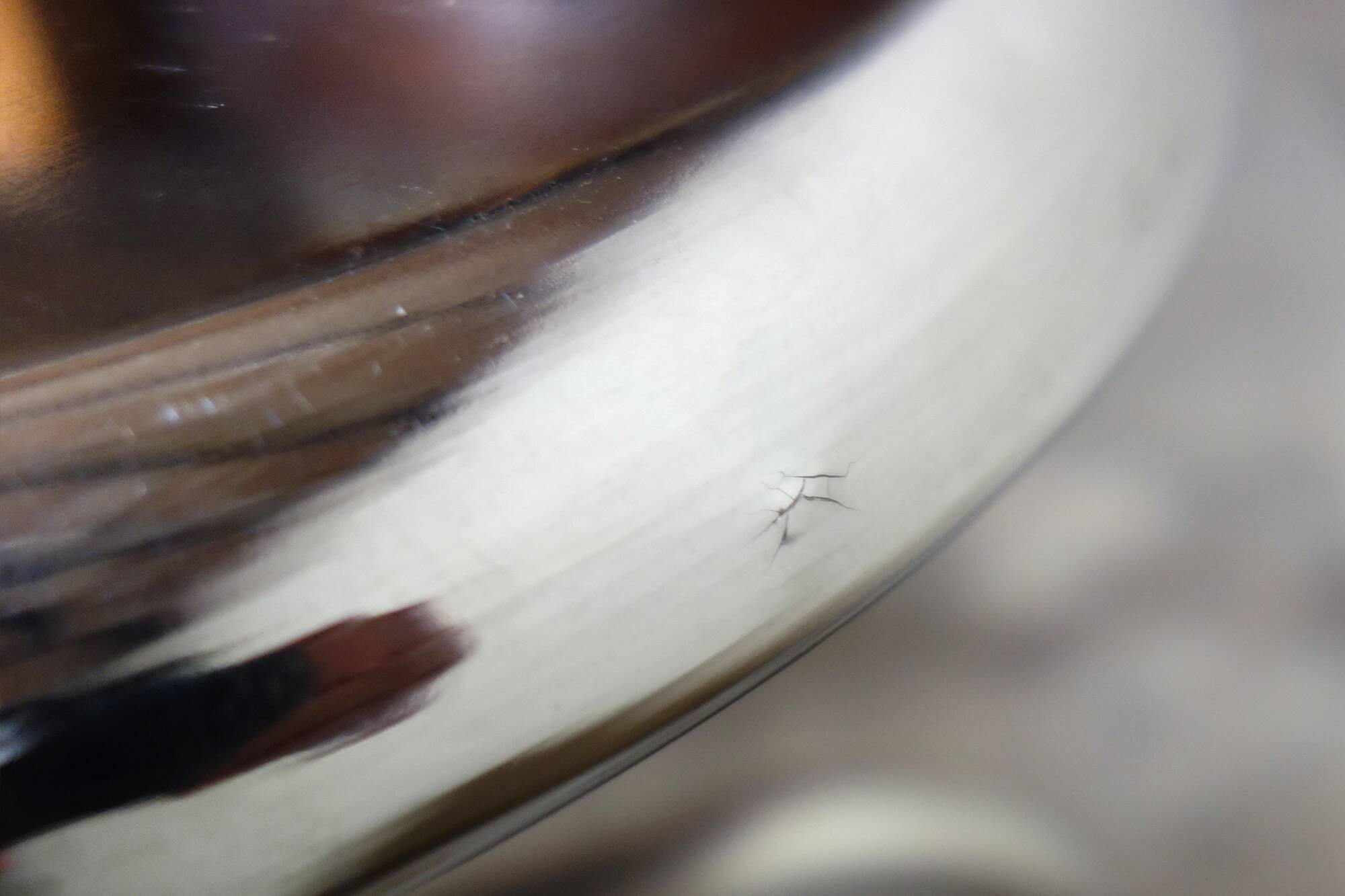 Old chrome metal swivel medical stool