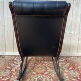 Fauteuil basculant Chesterfield en cuir noir