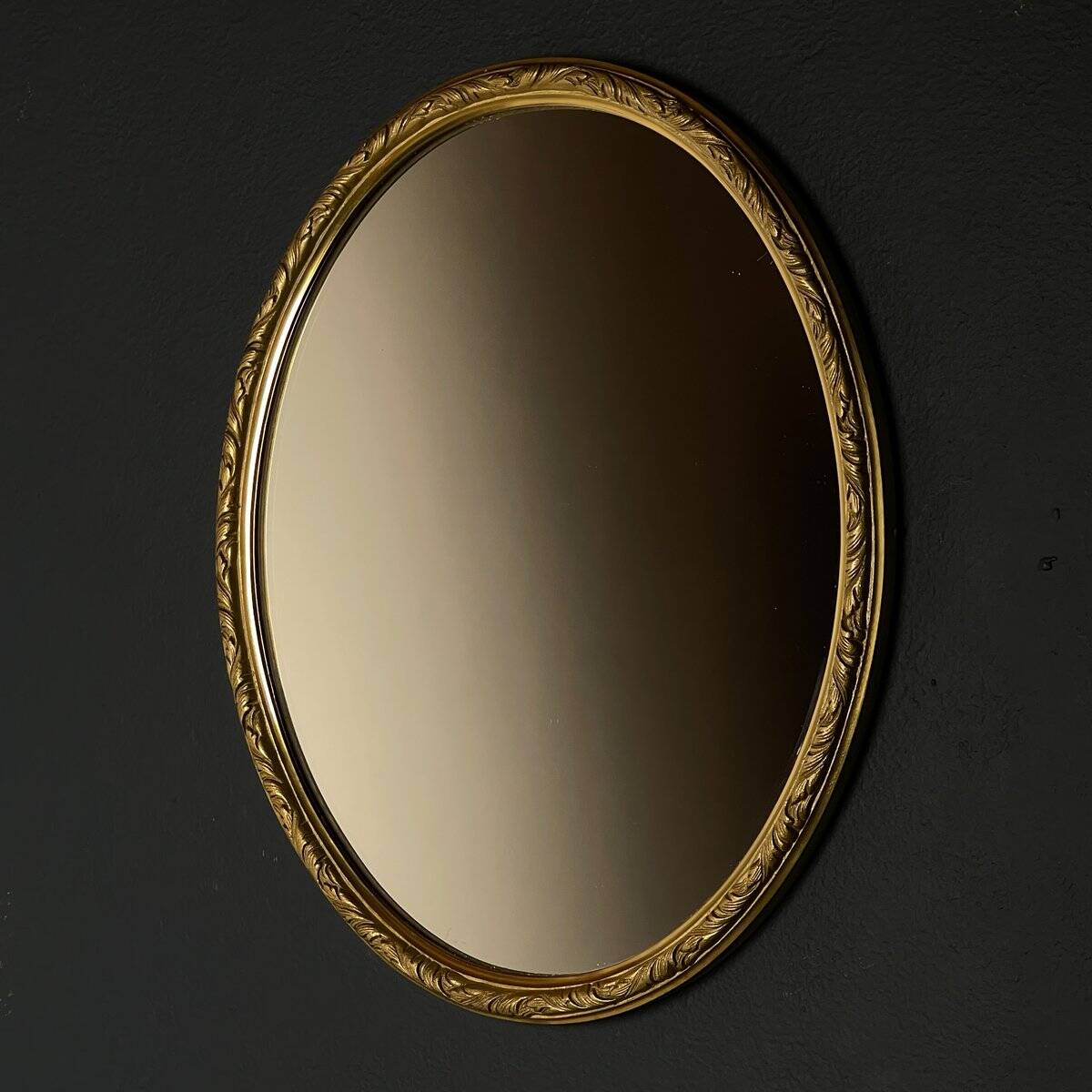 Vintage mirror in a brass frame, Italy, 1950s.