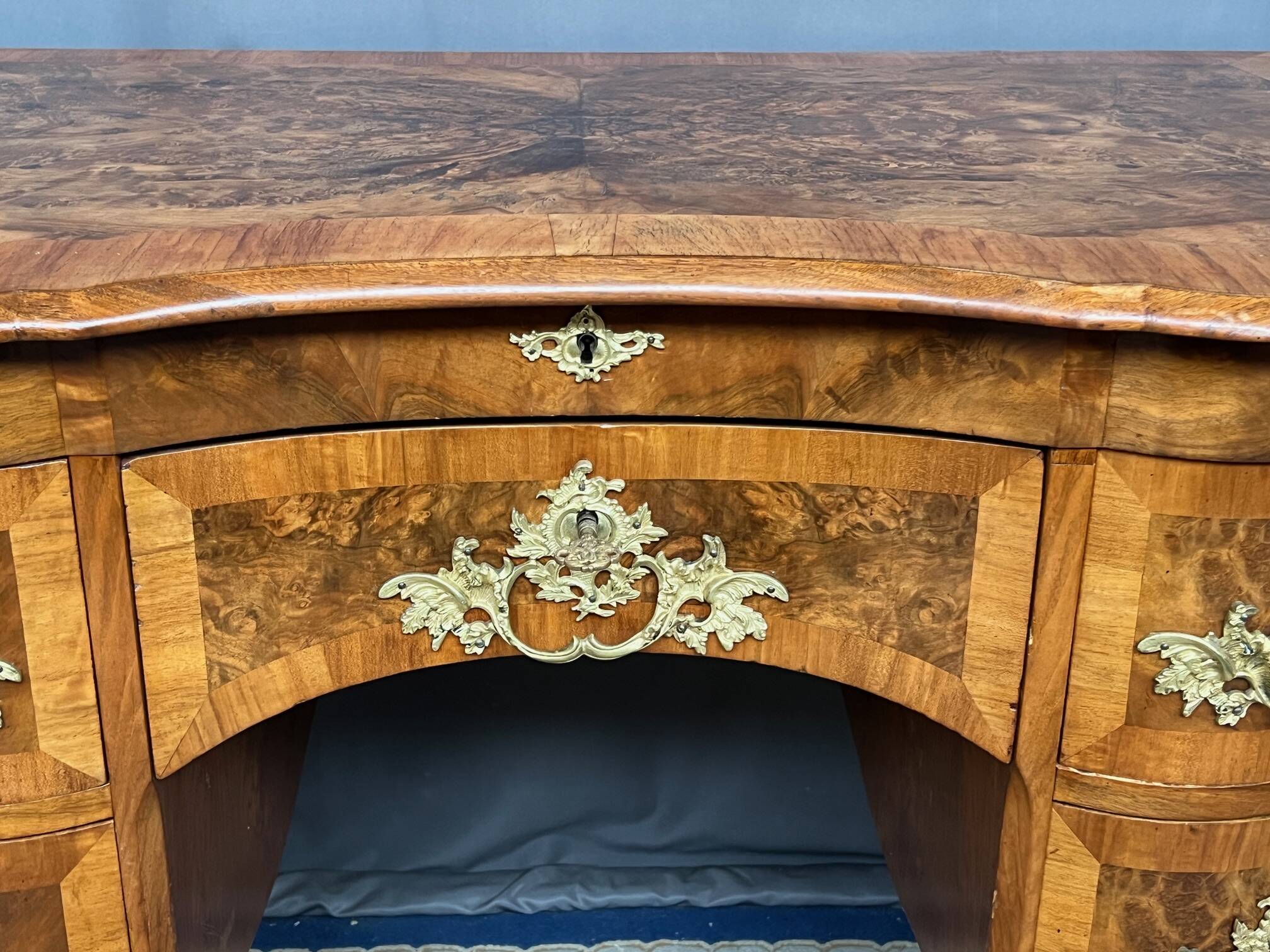 Antique baroque-style desk from Dresden with five drawers.