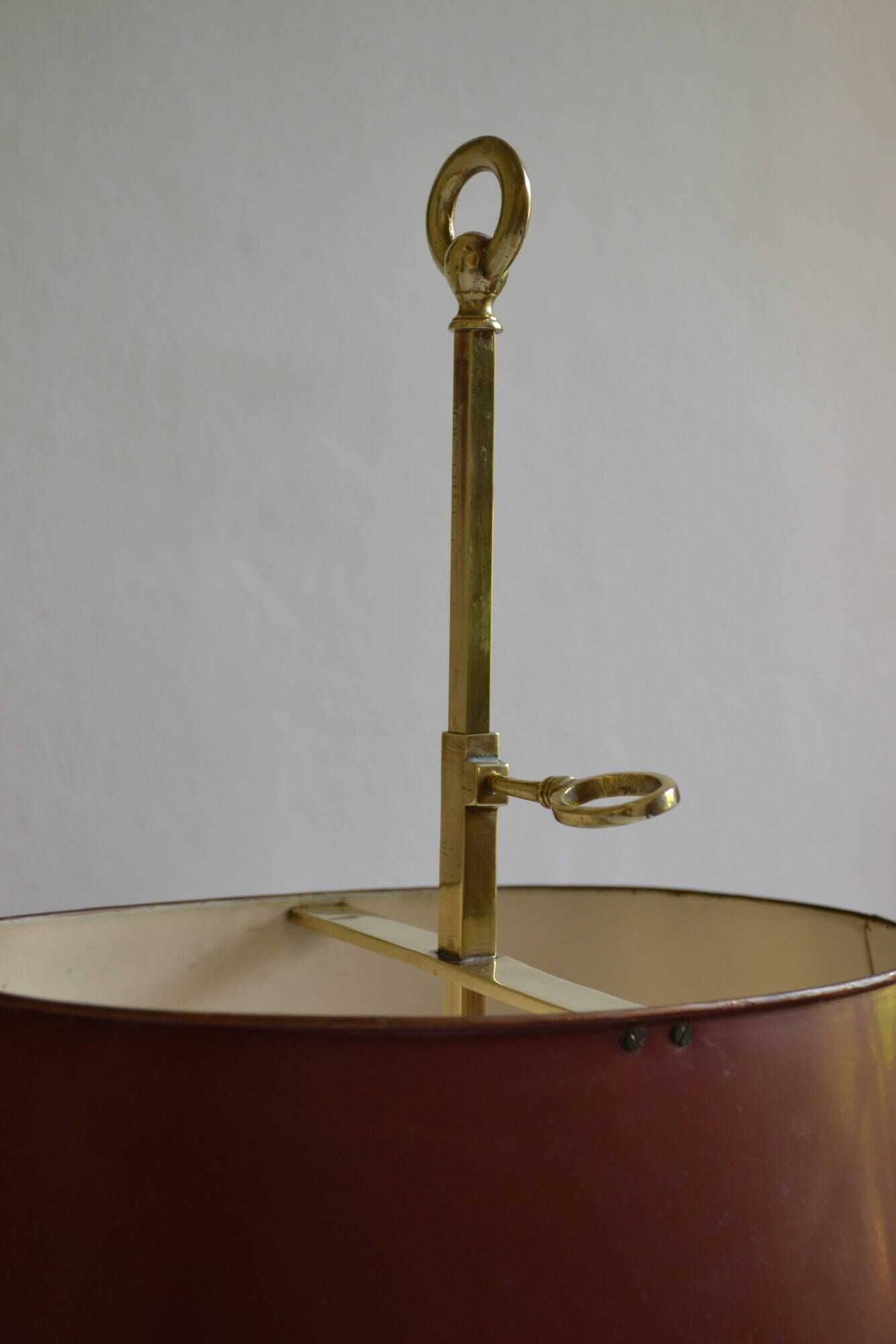hot water bottle lamp with 2 bronze lights and burgundy sheet metal lampshade