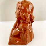 Bust of a pensive child in plaster