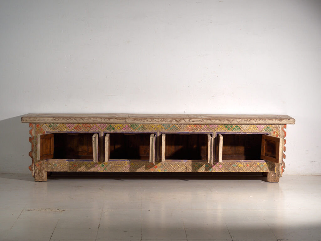 Antique polychrome carved low cabinet in pine – Xinjiang, circa 1900