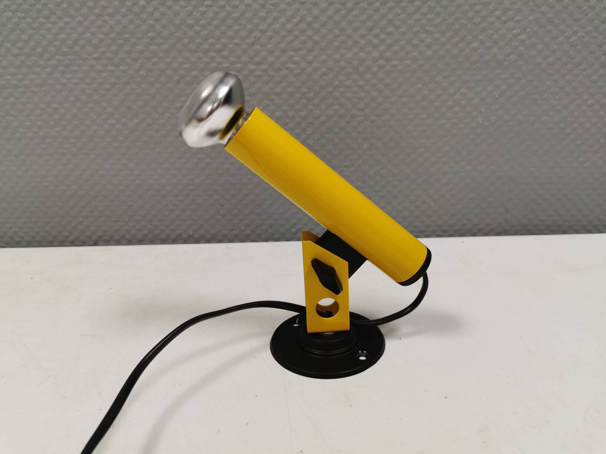 Small wall lamp in beautiful yellow color from Danish Nordlux 1980s.