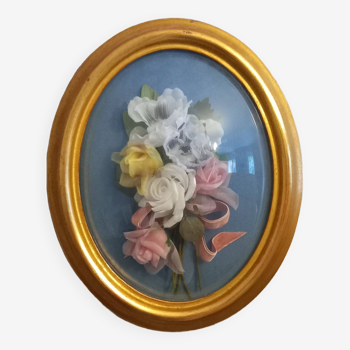 Silk flower frame under curved glass