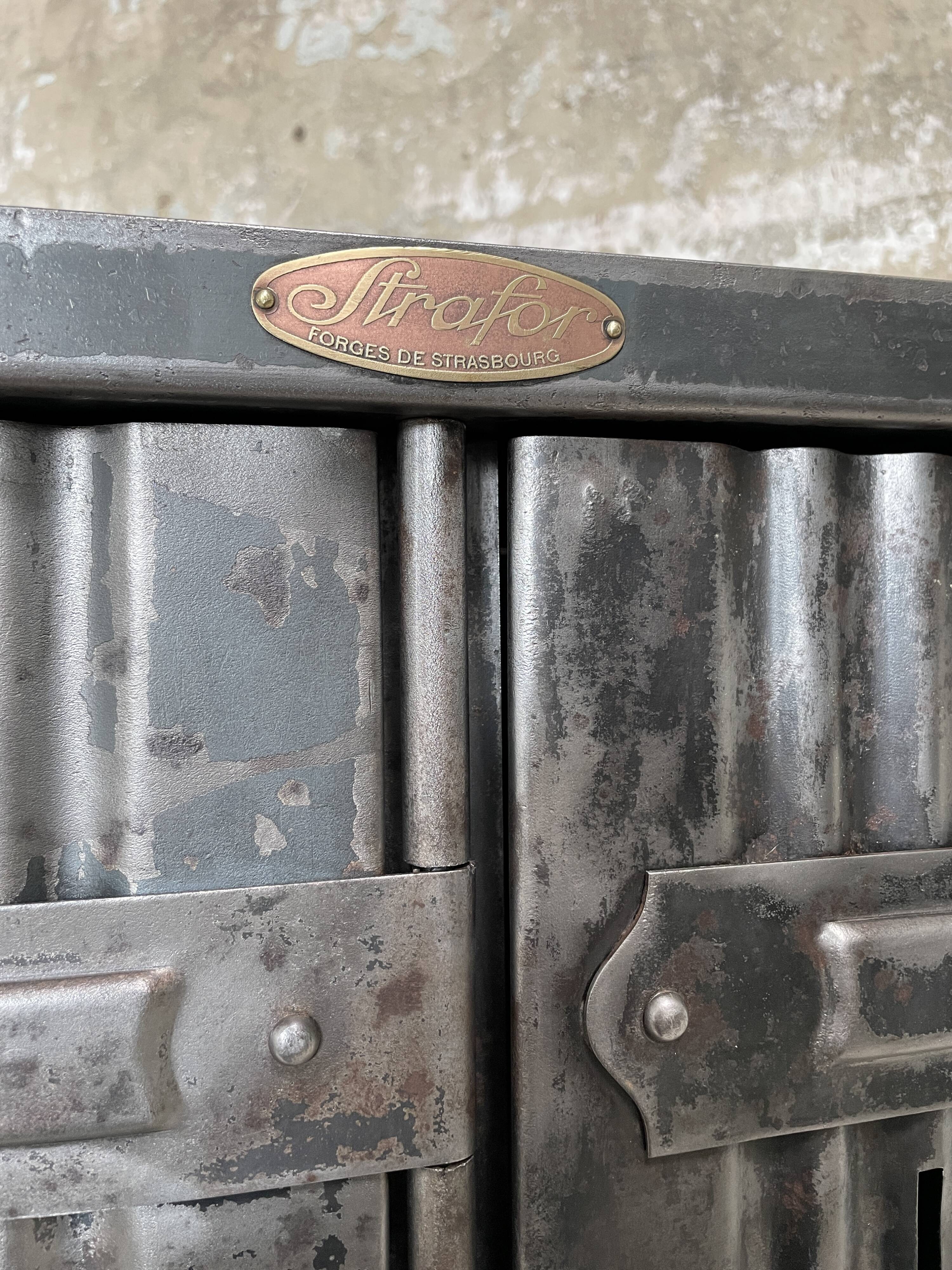 Strafor double-door corrugated iron cloakroom, circa 1920.