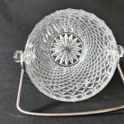Vintage glass ice bucket stamped with a metal handle