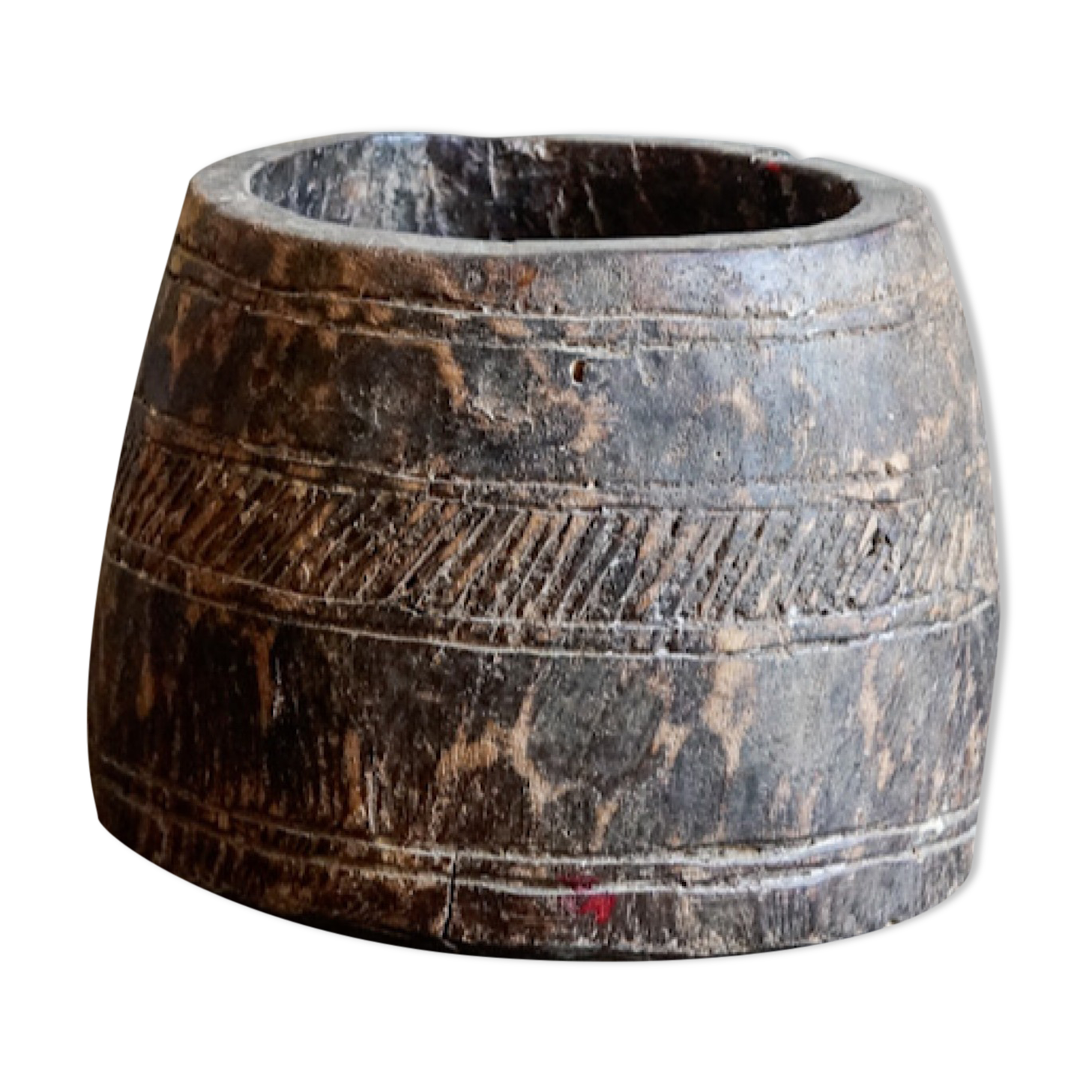 Old pot carved in wood