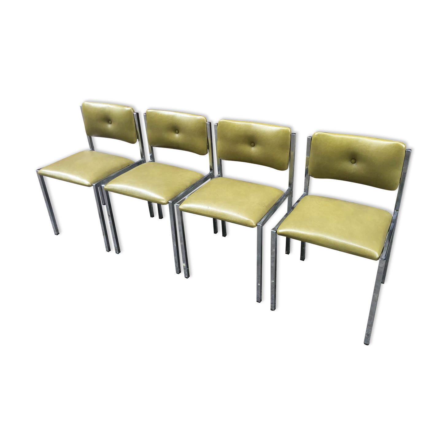 Series of 4 vintage chairs in Skaï