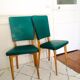 Two 1950s chairs made of wood and skai