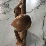 Pensive man wooden statue