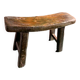 Antique milking stool in rustic curved wood, 19th century