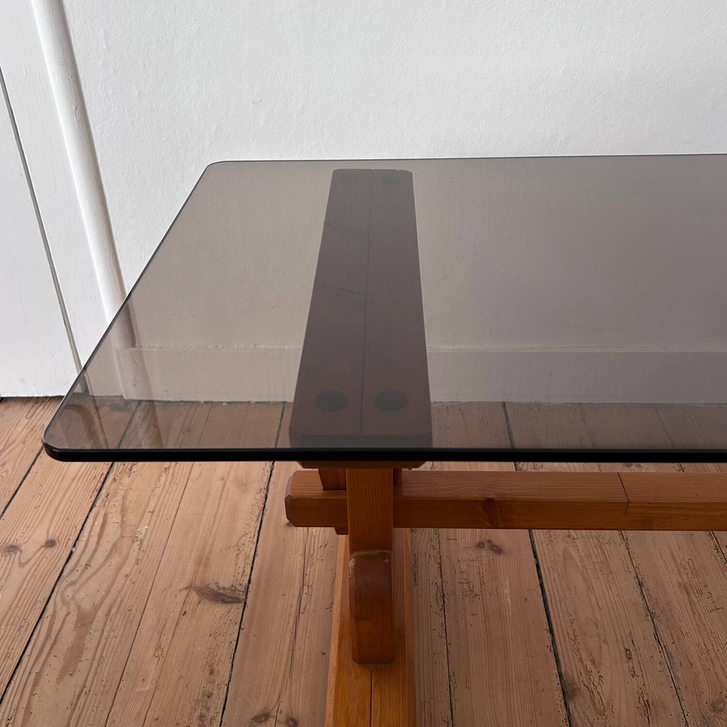Pine coffee table with smoked glass top.
