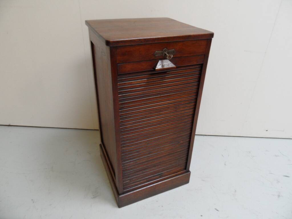 Antique filing cabinet with roller shutter