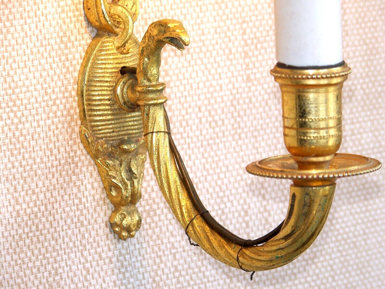 Simple wall sconce in classic Empire style made of vintage French cast brass 4316.
