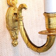 Simple wall sconce in classic Empire style made of vintage French cast brass 4316.
