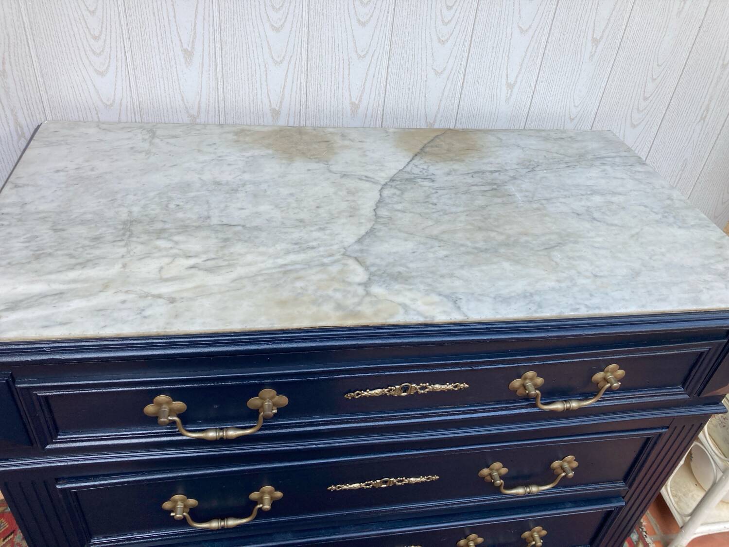 Chest of drawers with marble